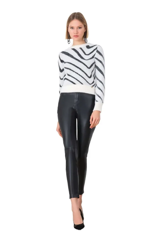 Andreola leather skinny pants, featuring a form-fitting design with a sleek, edgy look. Ideal for both casual and evening wear, these trendy pants offer a flattering silhouette and a bold, modern statement to any outfit.