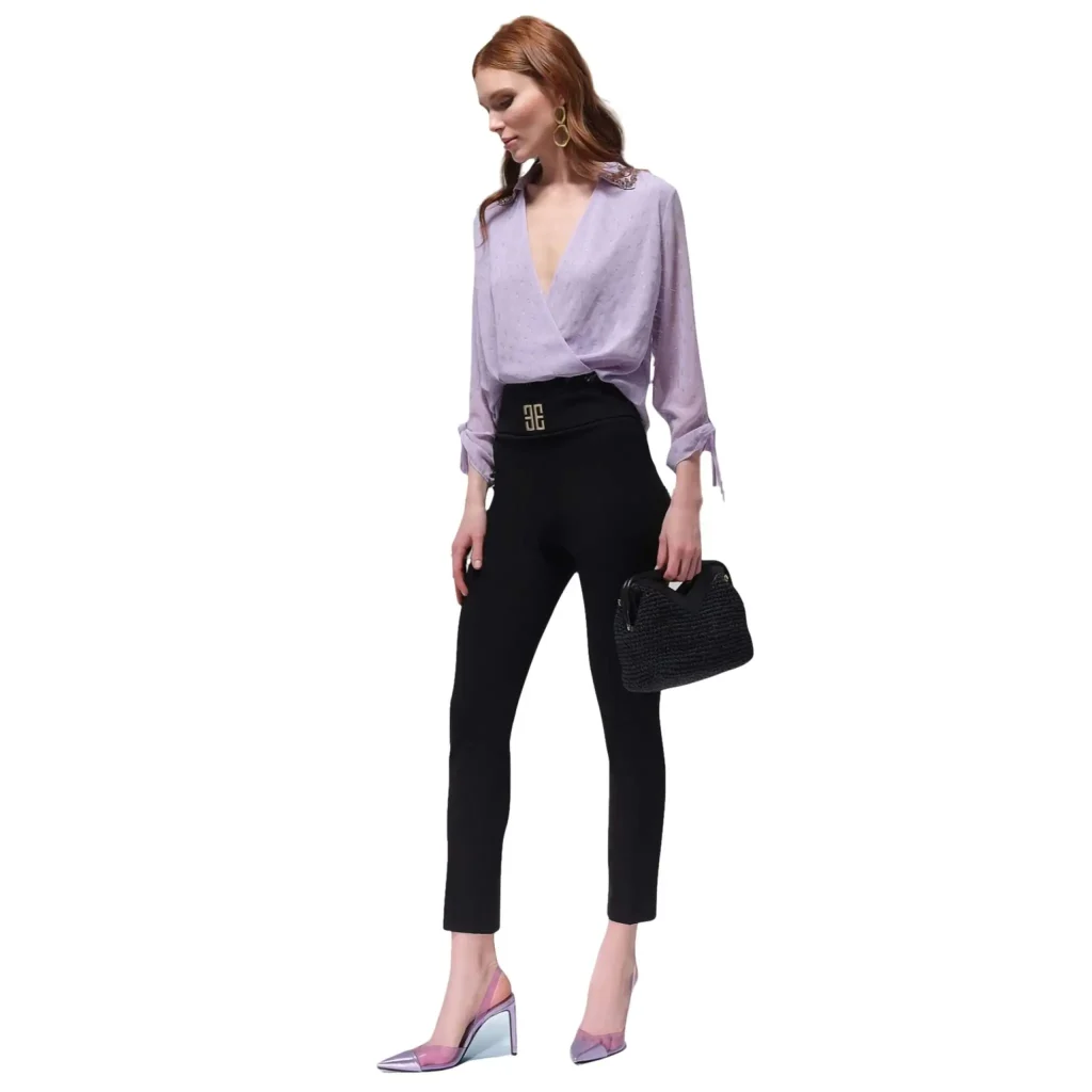 Gemma lilac blouse, featuring a soft, pastel hue and a flattering, feminine fit. Perfect for both casual and semi-formal occasions, this stylish blouse offers a delicate, elegant look with a refreshing burst of color.