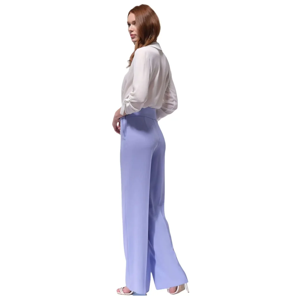 Elegant white collared blouse worn by a model, styled with light purple pants, perfect for business or casual wear. The blouse offers a stylish, polished look ideal for summer office attire or chic, everyday fashion
