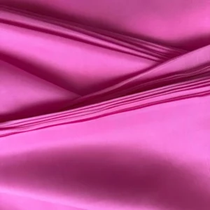 Rolled italian raspberry Silk Satin fabric with luxurious finish, ideal for shirts, skirts, or dresses